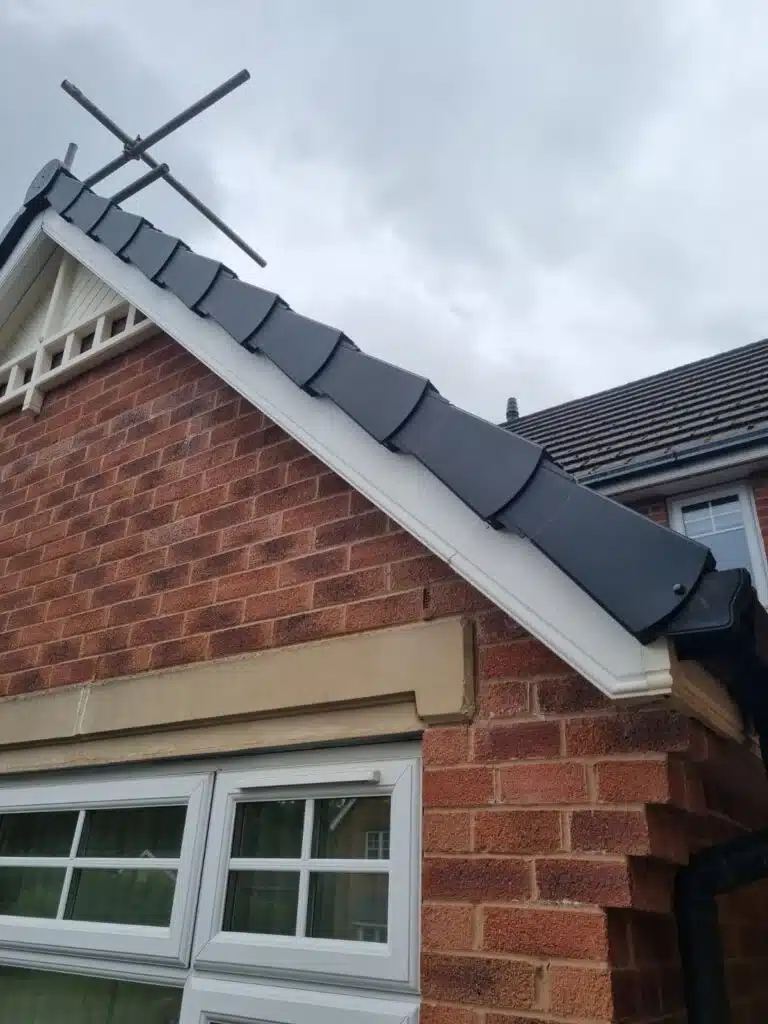 Close-up of finished grey dry verge units on a Chesterfield home